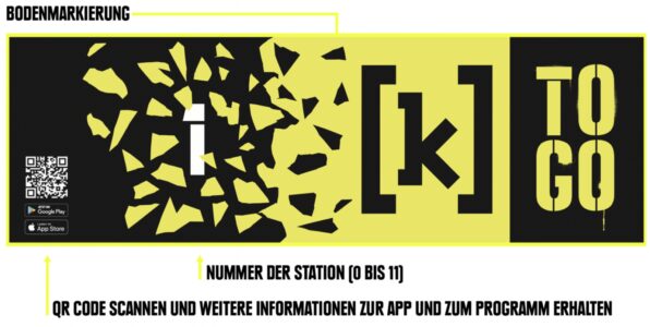 Example of a yellow-black floor marking of the [k] to go app.